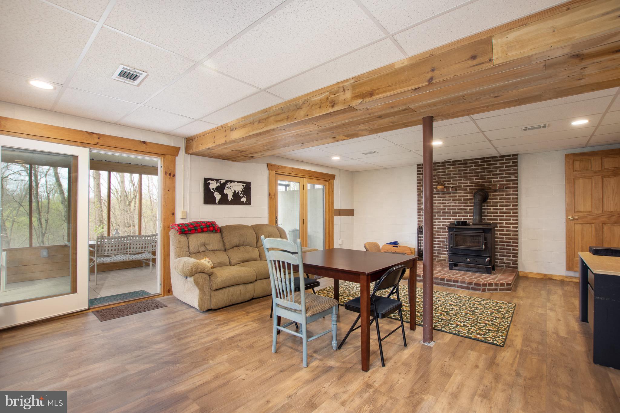 232 Wesley Road Quarryville, PA 17566 - Photo 48 of 69 2 sliders, one to patio and one to screened porch