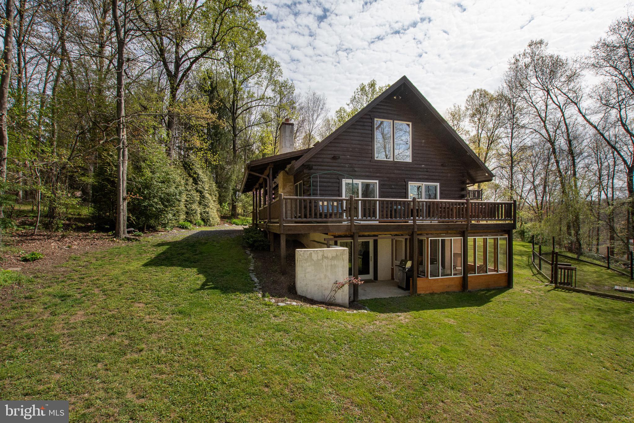 232 Wesley Road Quarryville, PA 17566 - Photo 6 of 69 Open deck above patio and screened porch