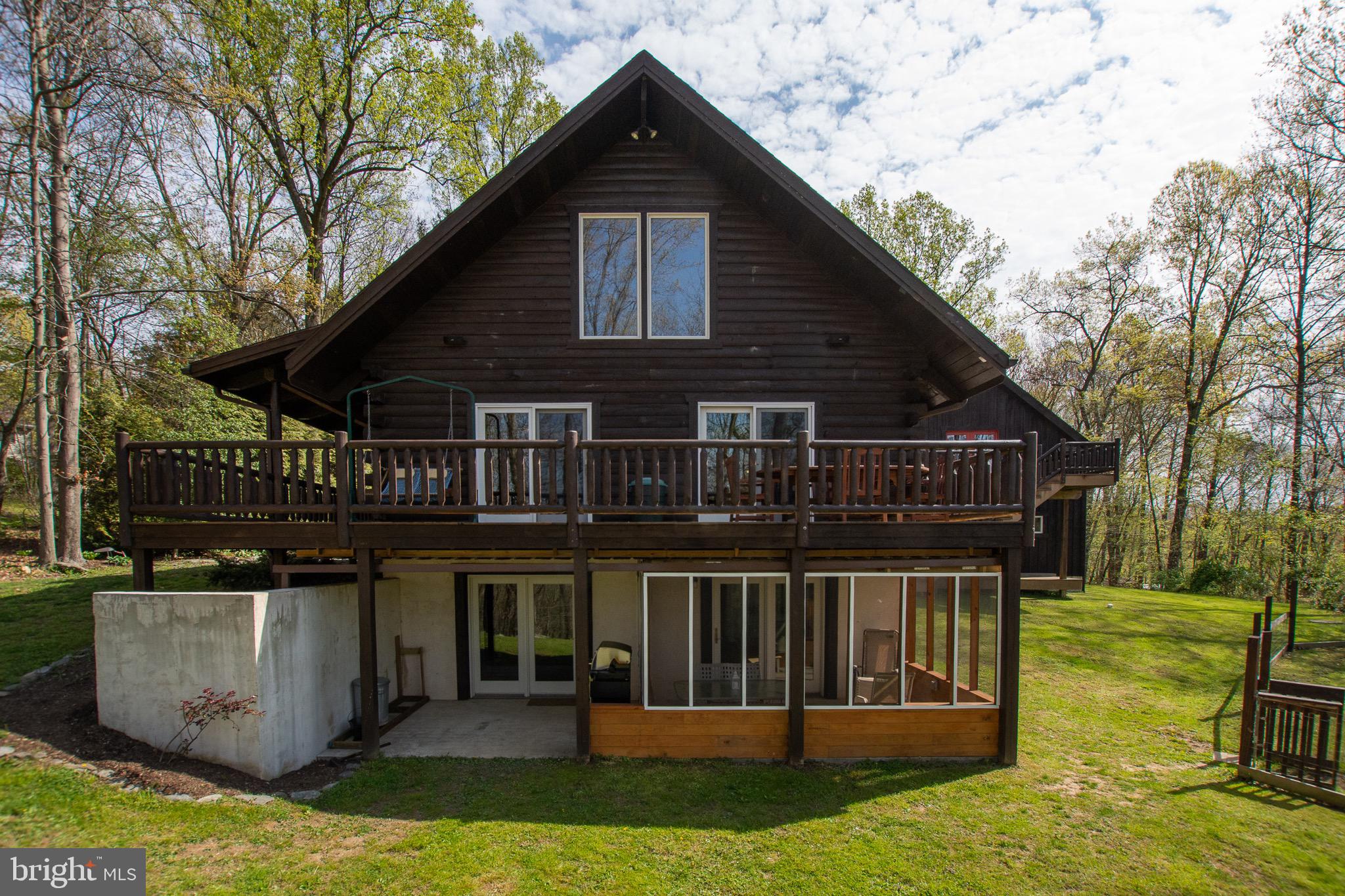 232 Wesley Road Quarryville, PA 17566 - Photo 7 of 69 Lower level walk out, patio and screened porch