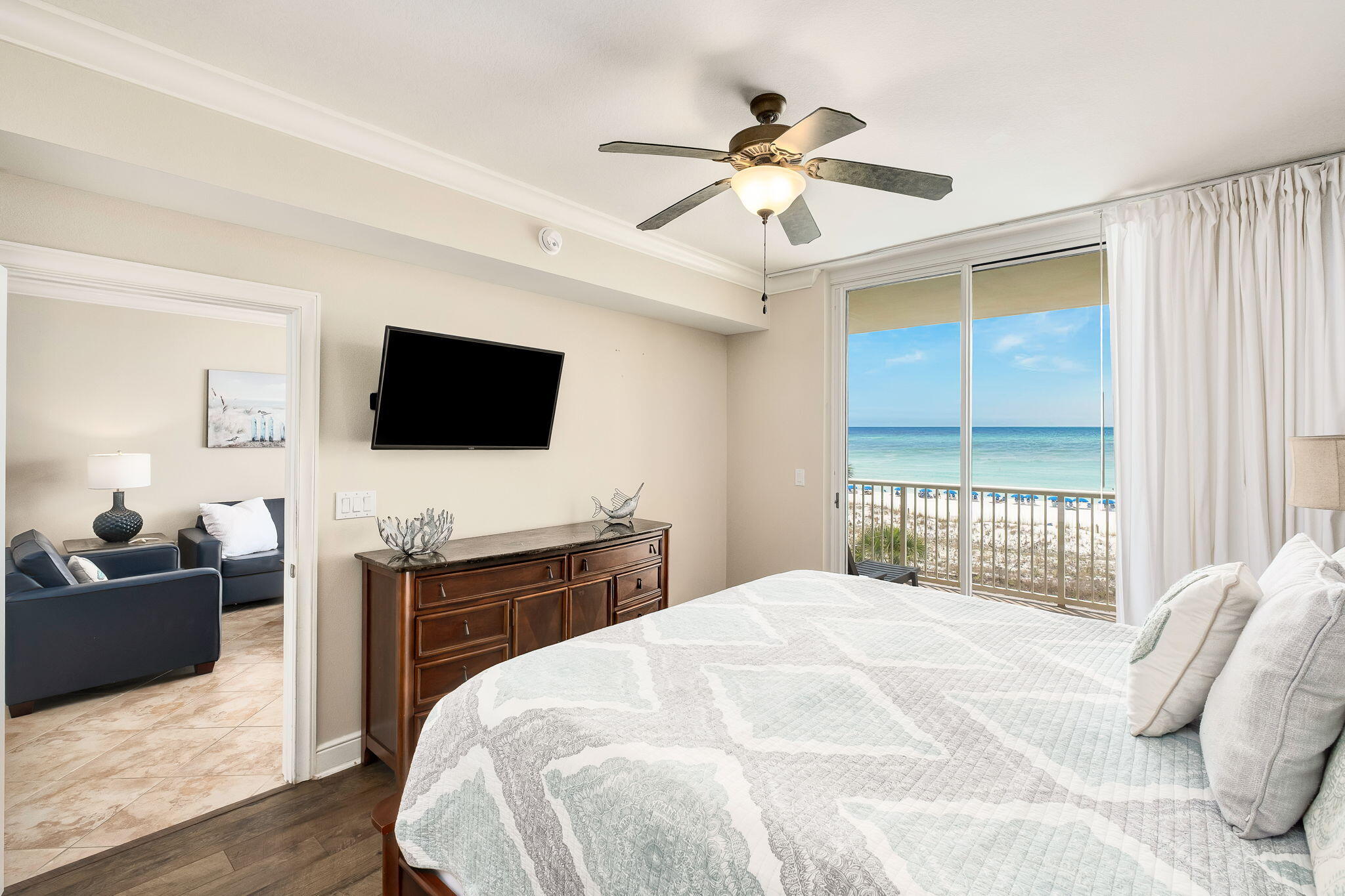 1150 Santa Rosa Boulevard, Unit 305 Fort Walton Beach, FL 32548 - Photo 11 of 43 a bedroom with a bed and a flat screen tv