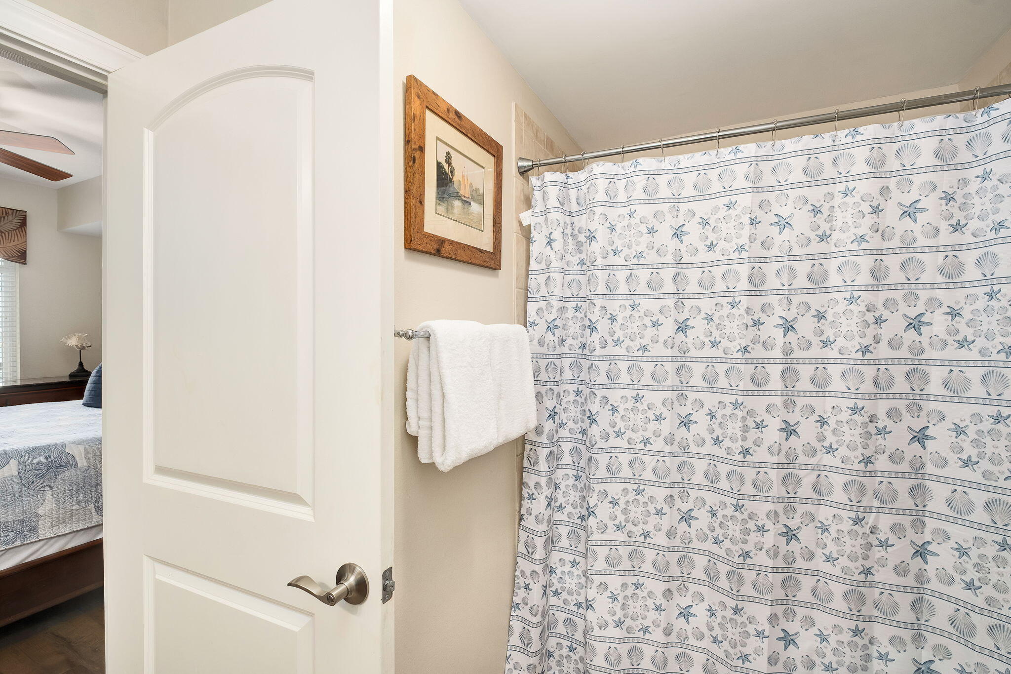 1150 Santa Rosa Boulevard, Unit 305 Fort Walton Beach, FL 32548 - Photo 28 of 43 a bathroom with a shower curtain