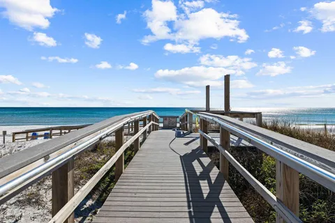 a view of a balcony with an ocean view