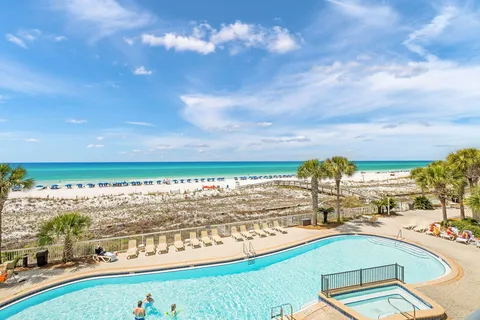 a view of a swimming pool with an ocean view