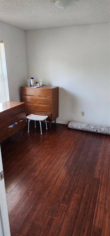 716 Violet Court Mesquite, TX 75150 - Photo 14 of 19 a workspace with furniture wooden floor and a window