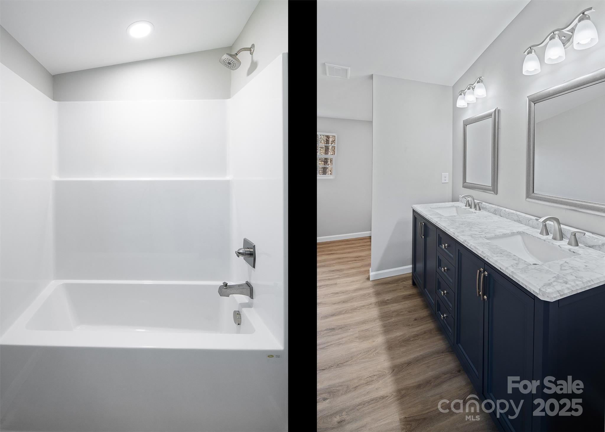 166 Brook Creek Drive Troutman, NC 28166 - Photo 23 of 26 a spacious bathroom with a tub sink shower and a mirror