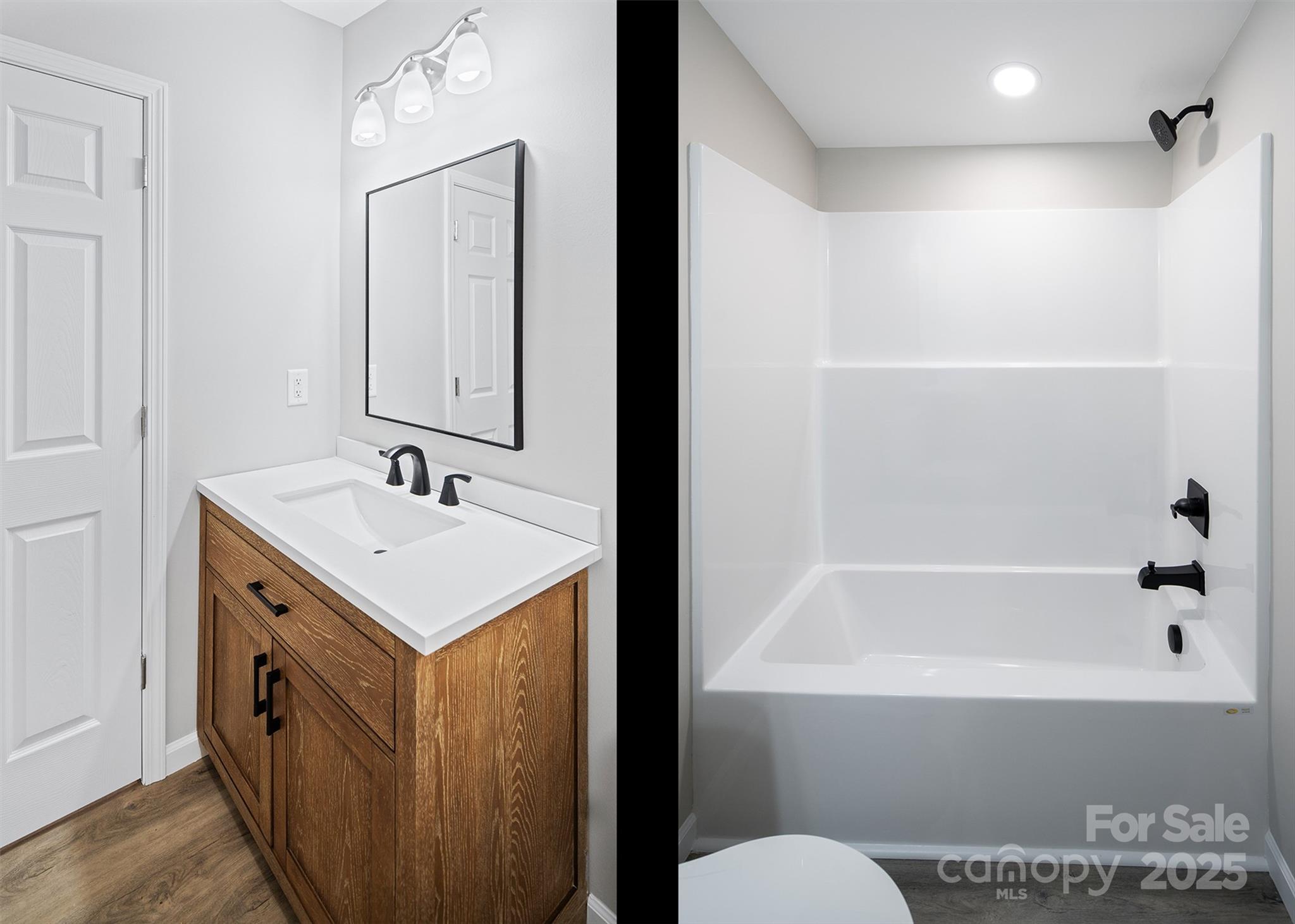 166 Brook Creek Drive Troutman, NC 28166 - Photo 24 of 26 a bathroom with a sink a toilet and shower