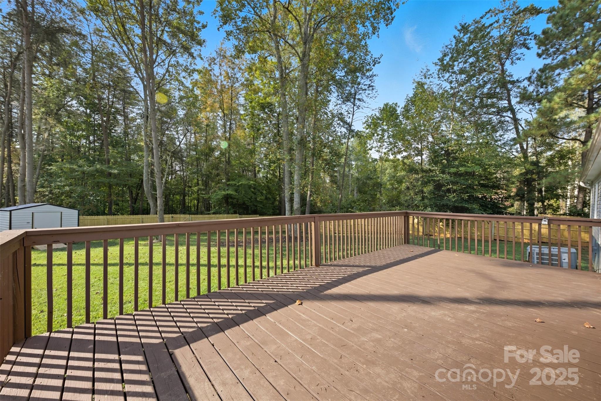 166 Brook Creek Drive Troutman, NC 28166 - Photo 6 of 26 a view of a wooden deck