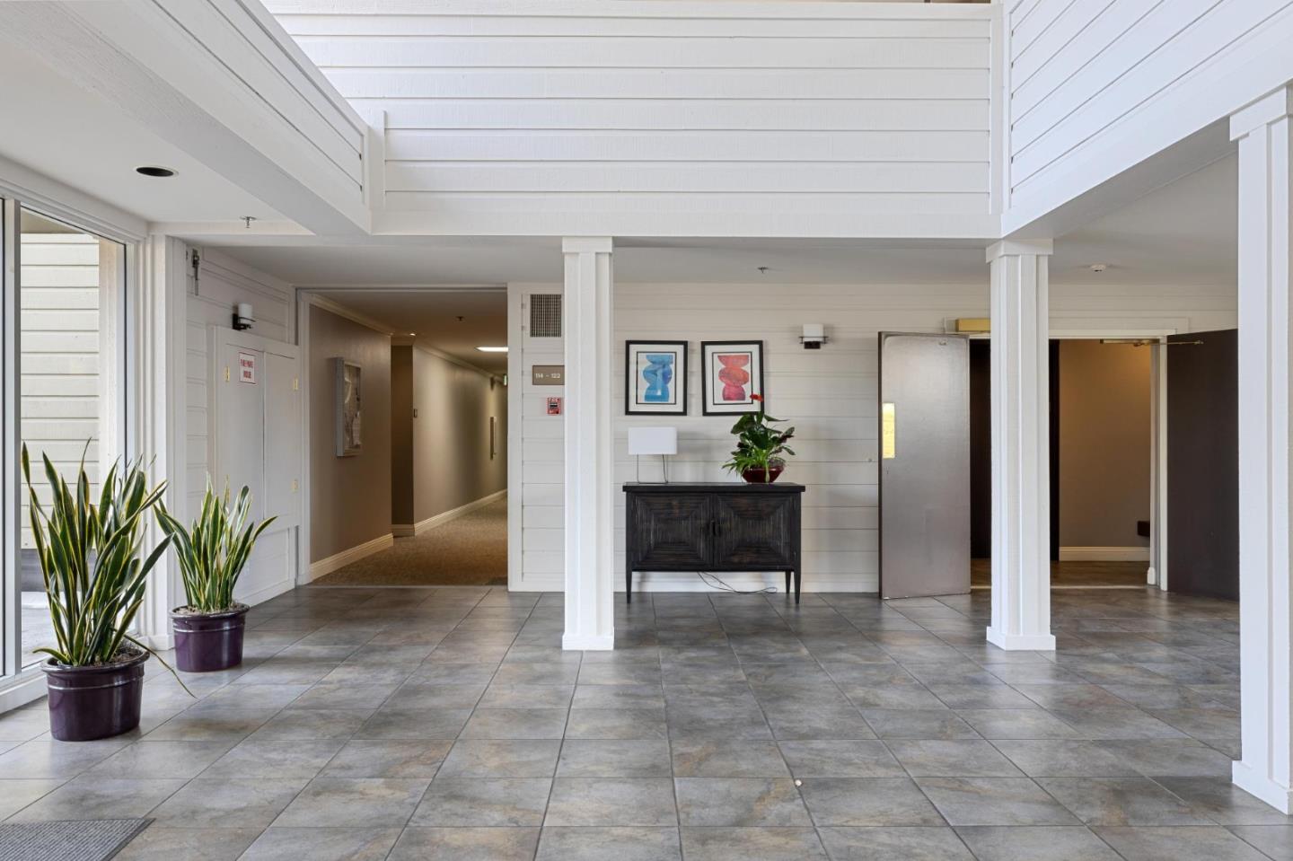 300 Murchison Drive, Unit 123 Millbrae, CA 94030 - Photo 18 of 25 a view of entryway with livingroom and hallway