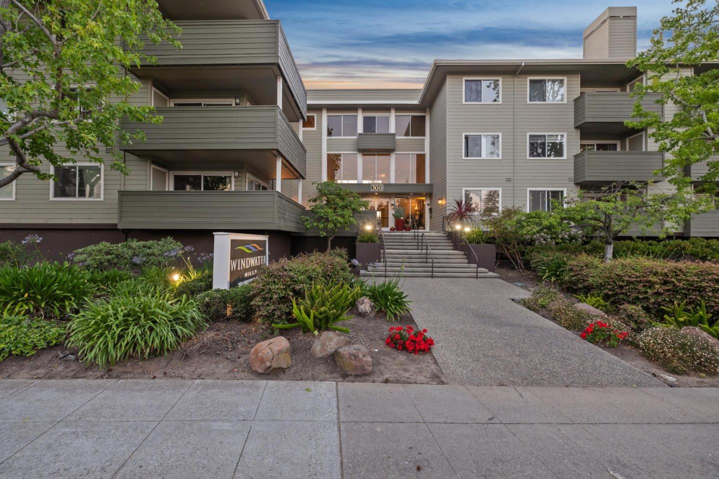 300 Murchison Drive, Unit 123 Millbrae, CA 94030 - Photo 21 of 25 a front view of a house with garden