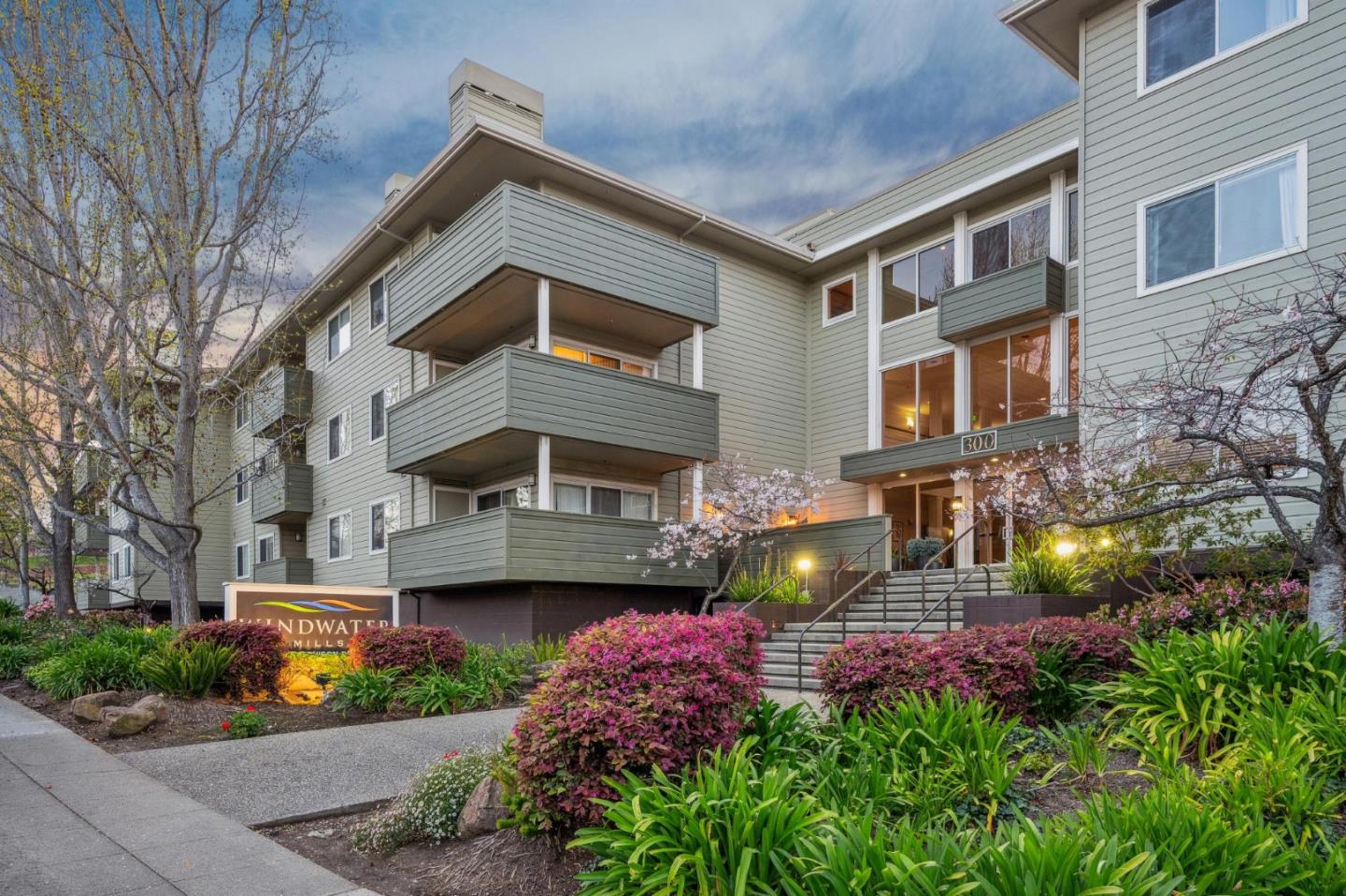 300 Murchison Drive, Unit 123 Millbrae, CA 94030 - Photo 22 of 25 a front view of a house with yard