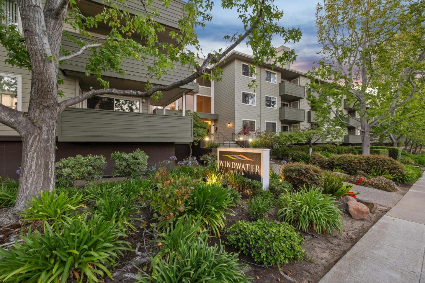 300 Murchison Drive, Unit 123 Millbrae, CA 94030 - Photo 23 of 25 a backyard of a house with table and chairs
