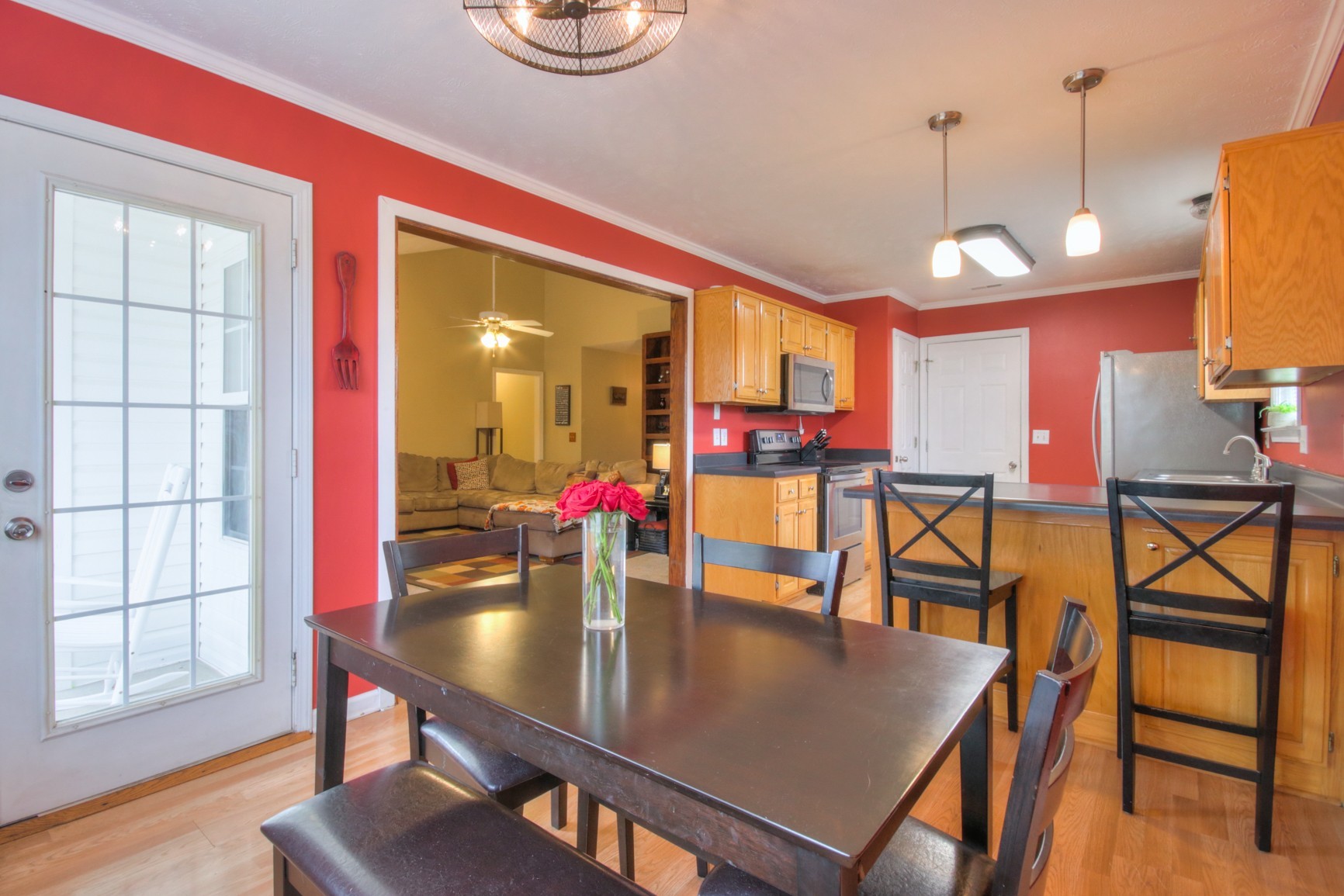 1031 Compton Road Murfreesboro, TN 37130 - Photo 1 of 21 a view of a dining room with furniture and wooden floor
