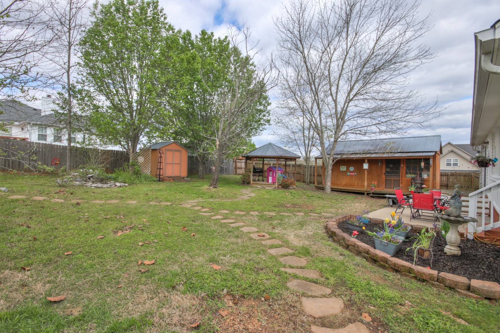 1031 Compton Road Murfreesboro, TN 37130 - Photo 19 of 21 a front view of a house with garden