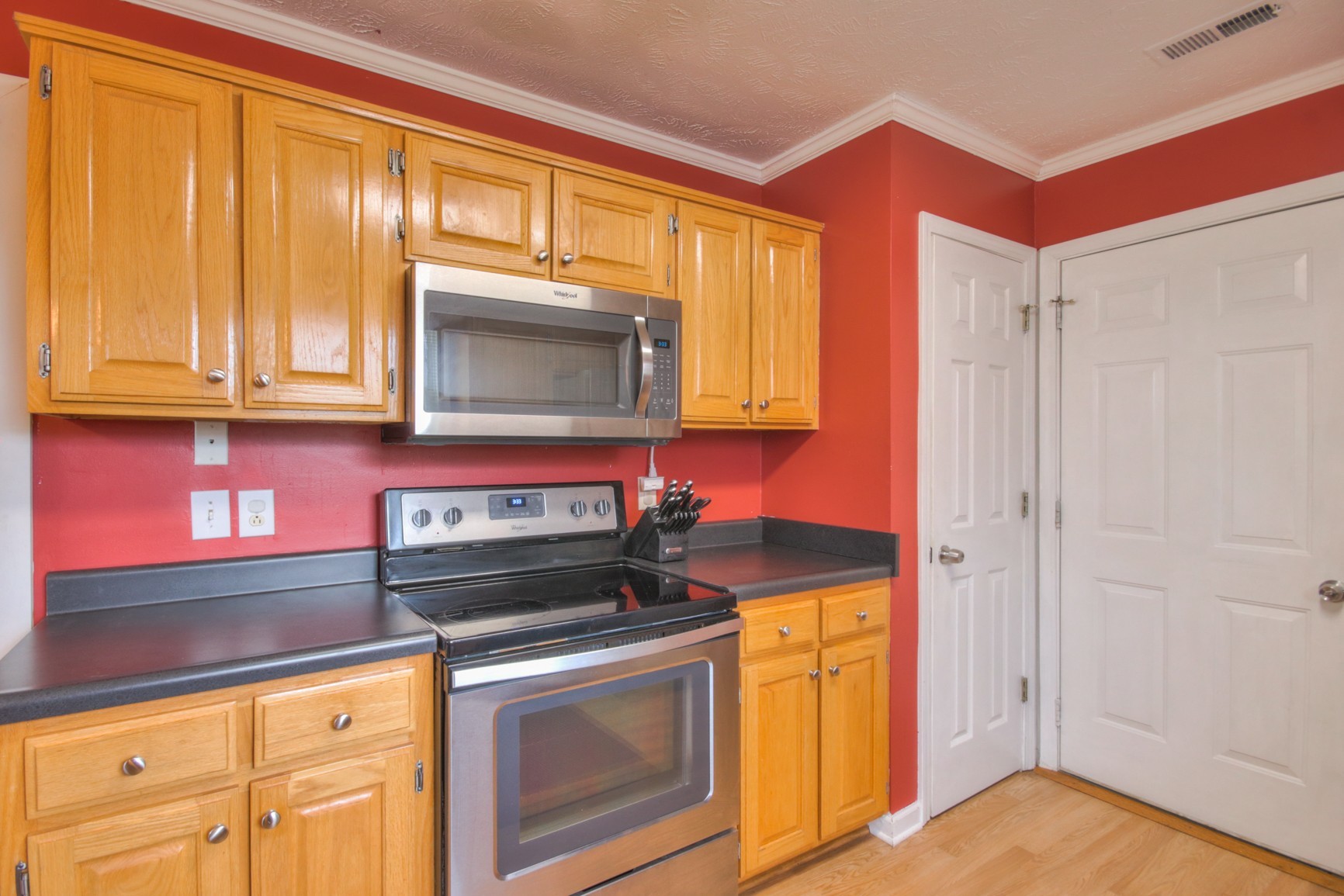 1031 Compton Road Murfreesboro, TN 37130 - Photo 2 of 21 a kitchen with stainless steel appliances granite countertop a stove and a microwave