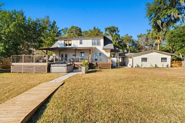 a view of a living room with furniture and a rug