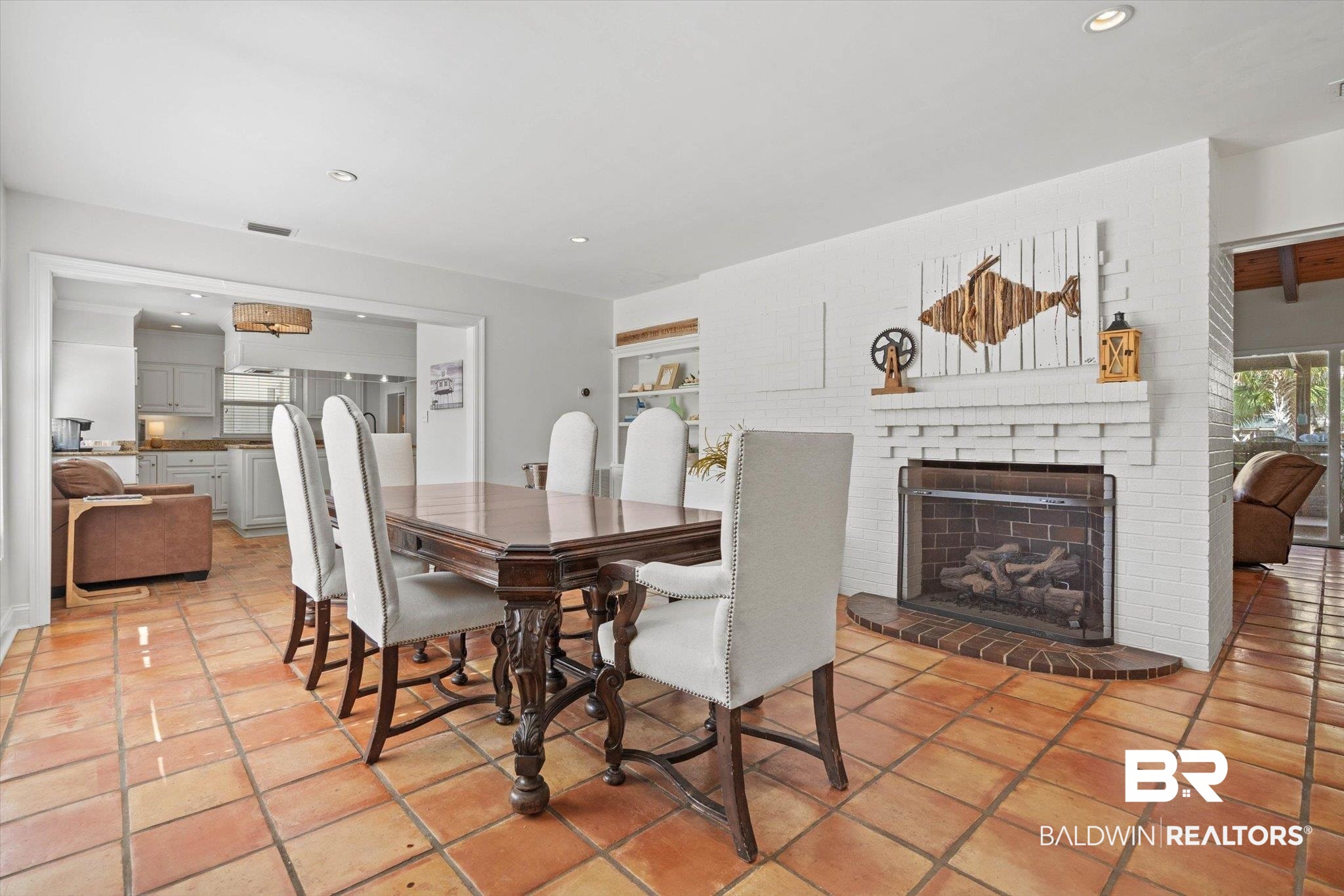 3720 Rabbit Creek Court Theodore, AL 36582 - Photo 5 of 47 Dining room with healthy amount of natural light, a brick fireplace, recessed lighting, and light tile patterned floors