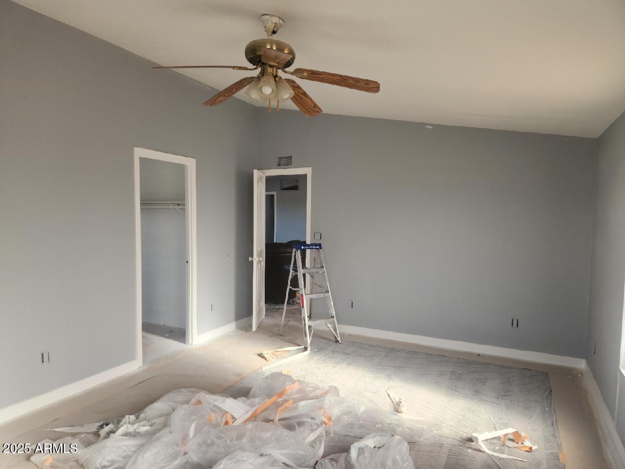 65623 Hall Street Salome, AZ 85348 - Photo 11 of 14 a view of a bedroom with a bed and hallway