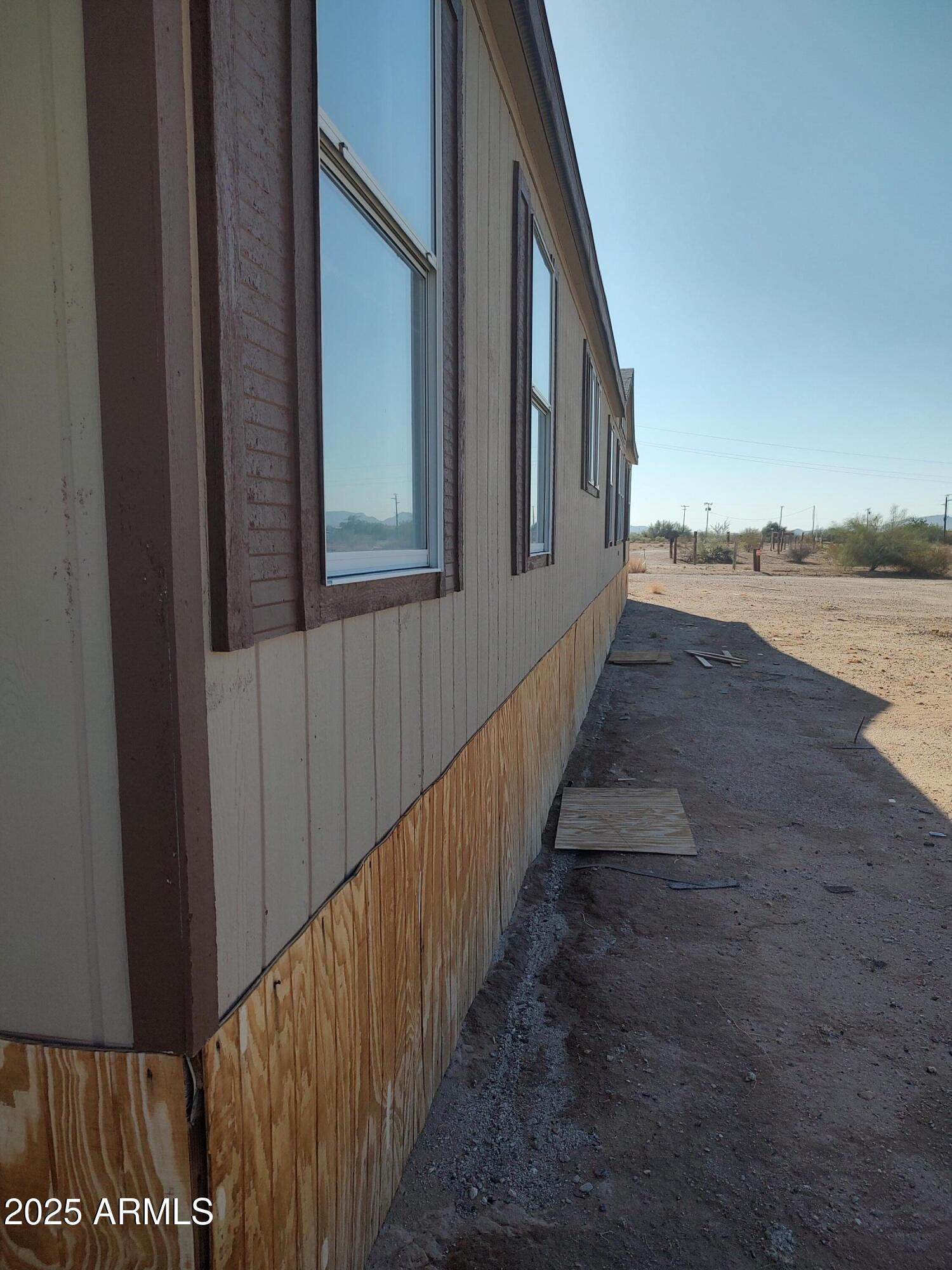 65623 Hall Street Salome, AZ 85348 - Photo 3 of 14 a view of a house with a yard