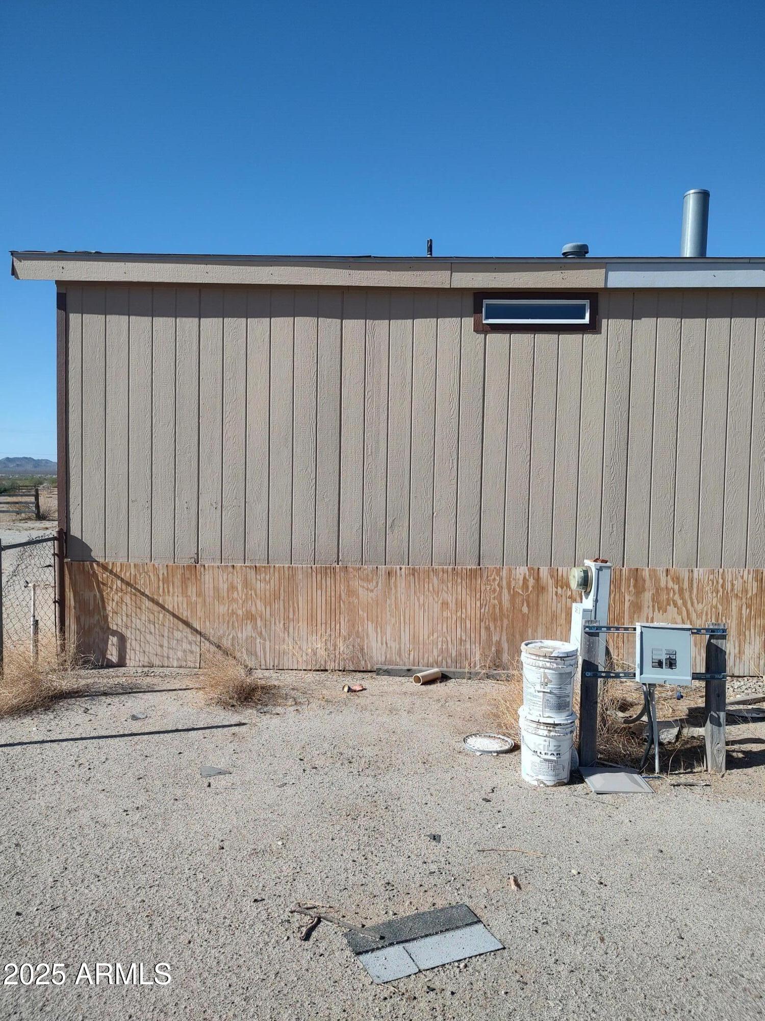 65623 Hall Street Salome, AZ 85348 - Photo 4 of 14 a view of a couch in kitchen