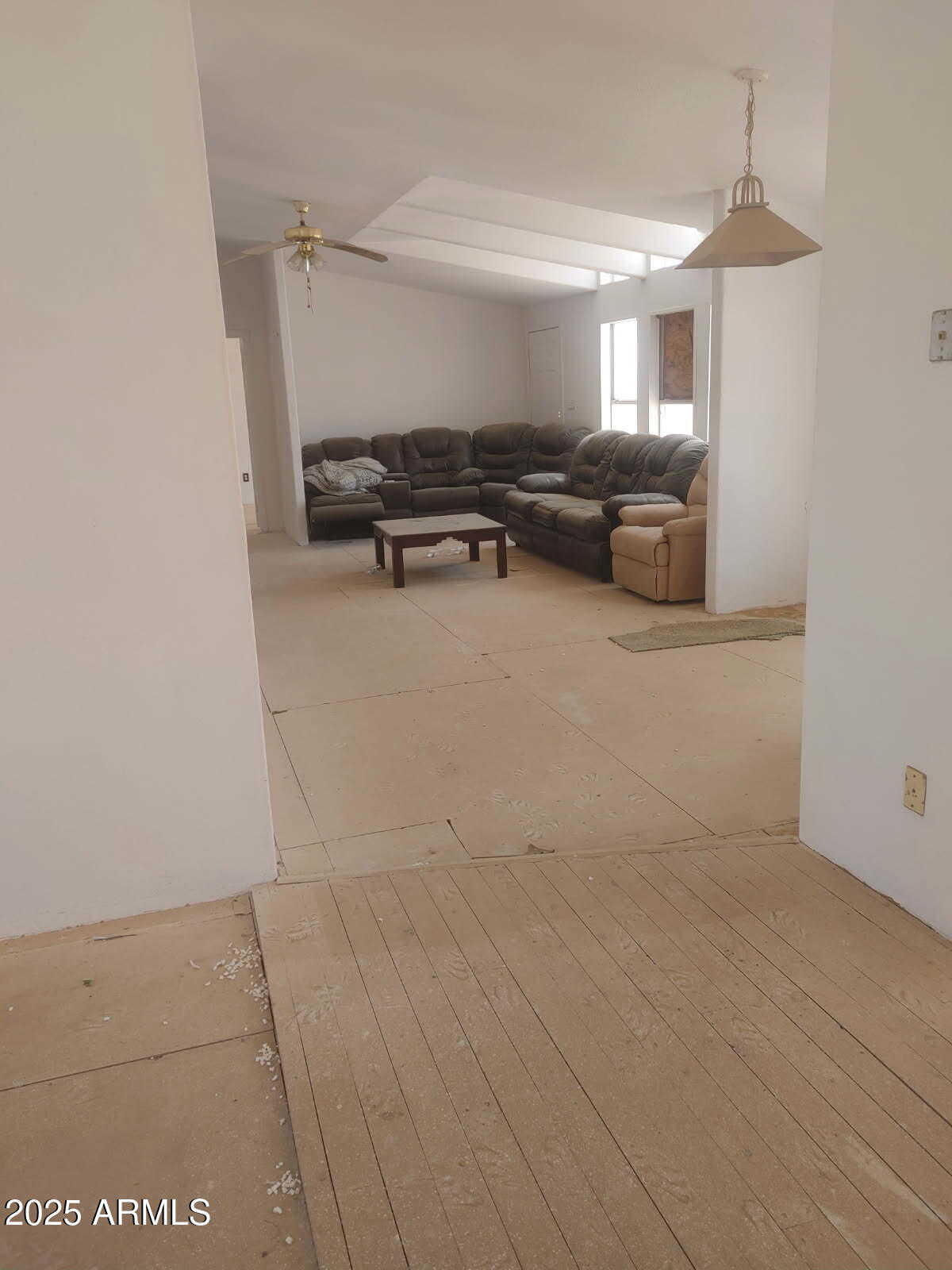 65623 Hall Street Salome, AZ 85348 - Photo 8 of 14 a living room with furniture and a flat screen tv