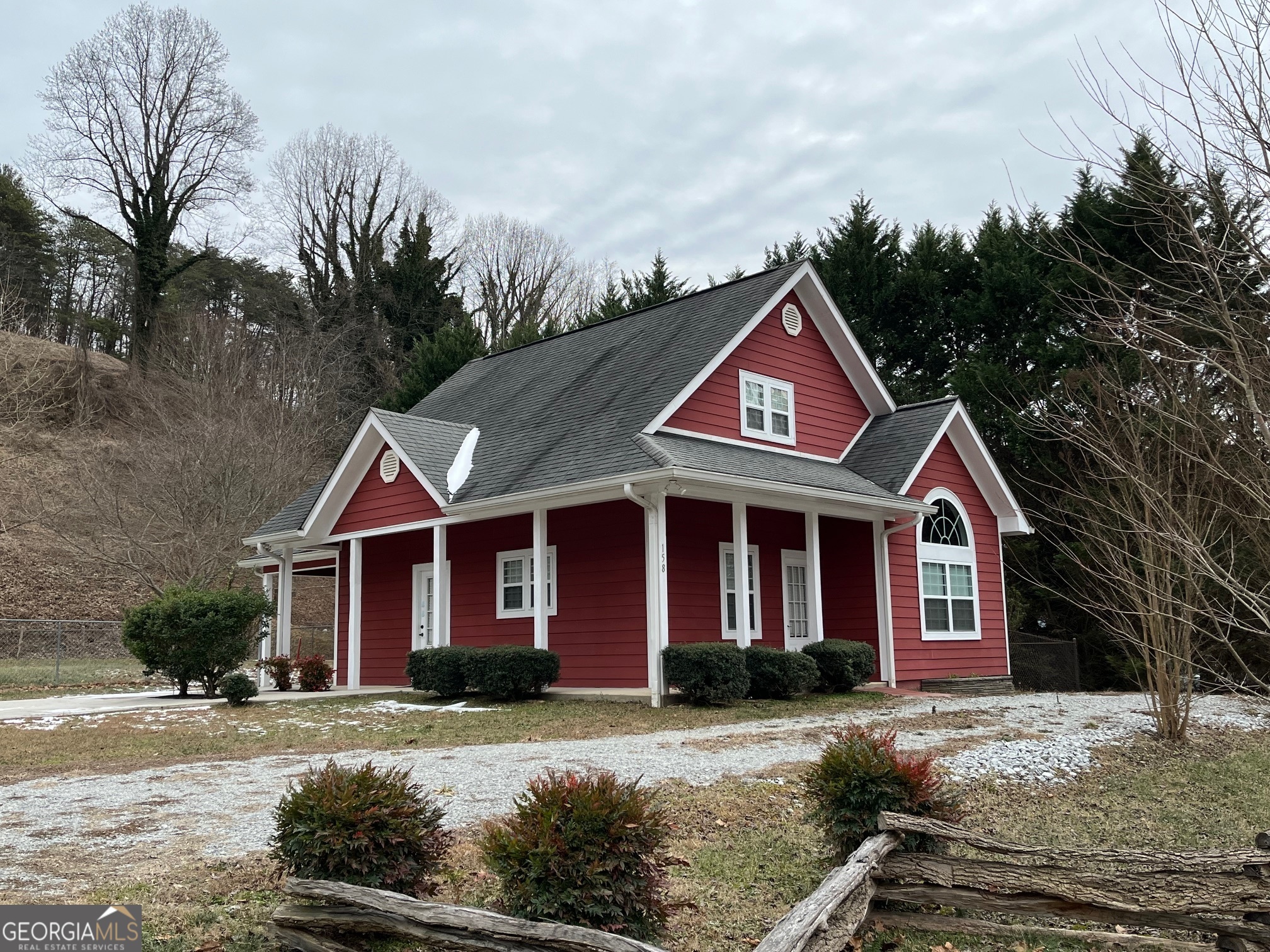 a front view of a house with yard