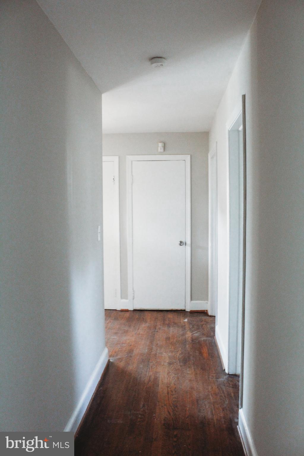 9101 Sudley Road Manassas, VA 20110 - Photo 18 of 19 an empty room with wooden floor