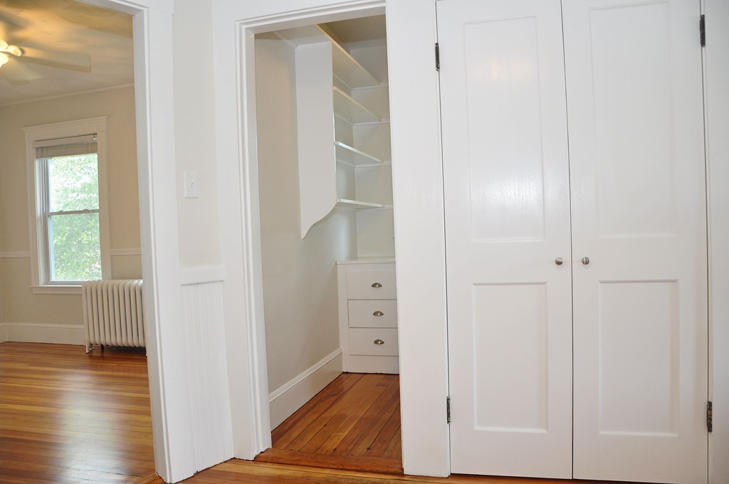 135-137 Thacher Street, Unit 2 Milton, MA 02186 - Photo 7 of 11 a view of entryway with wooden floor