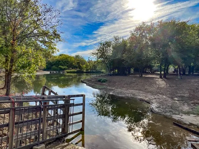 a view of a lake with an outdoor space