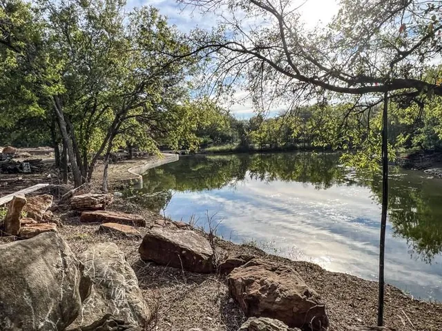 a view of a cars park in front of house