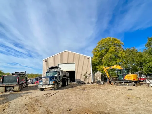 a view of a back yard of the house with car parked