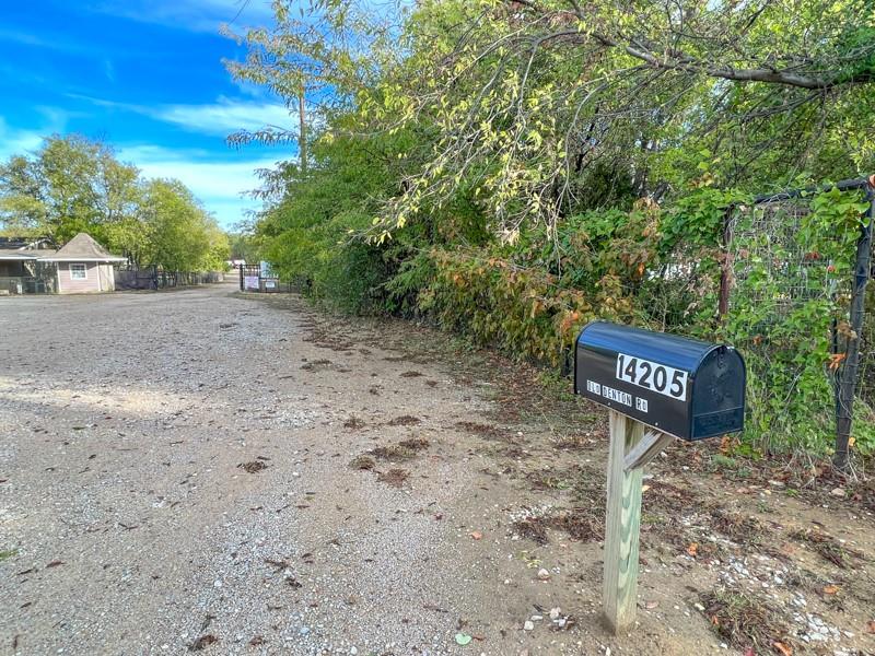 14205 Old Denton Road Roanoke, TX 76262 - Photo 2 of 29 a sign that is on the side of the road