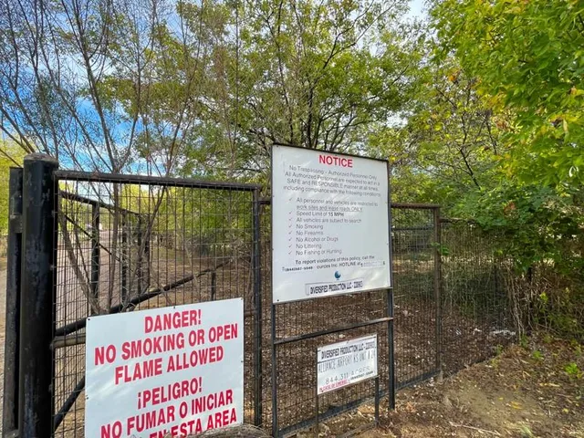 a sign board with a yard