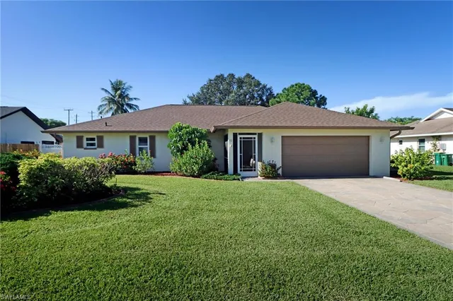 front view of a house and a yard