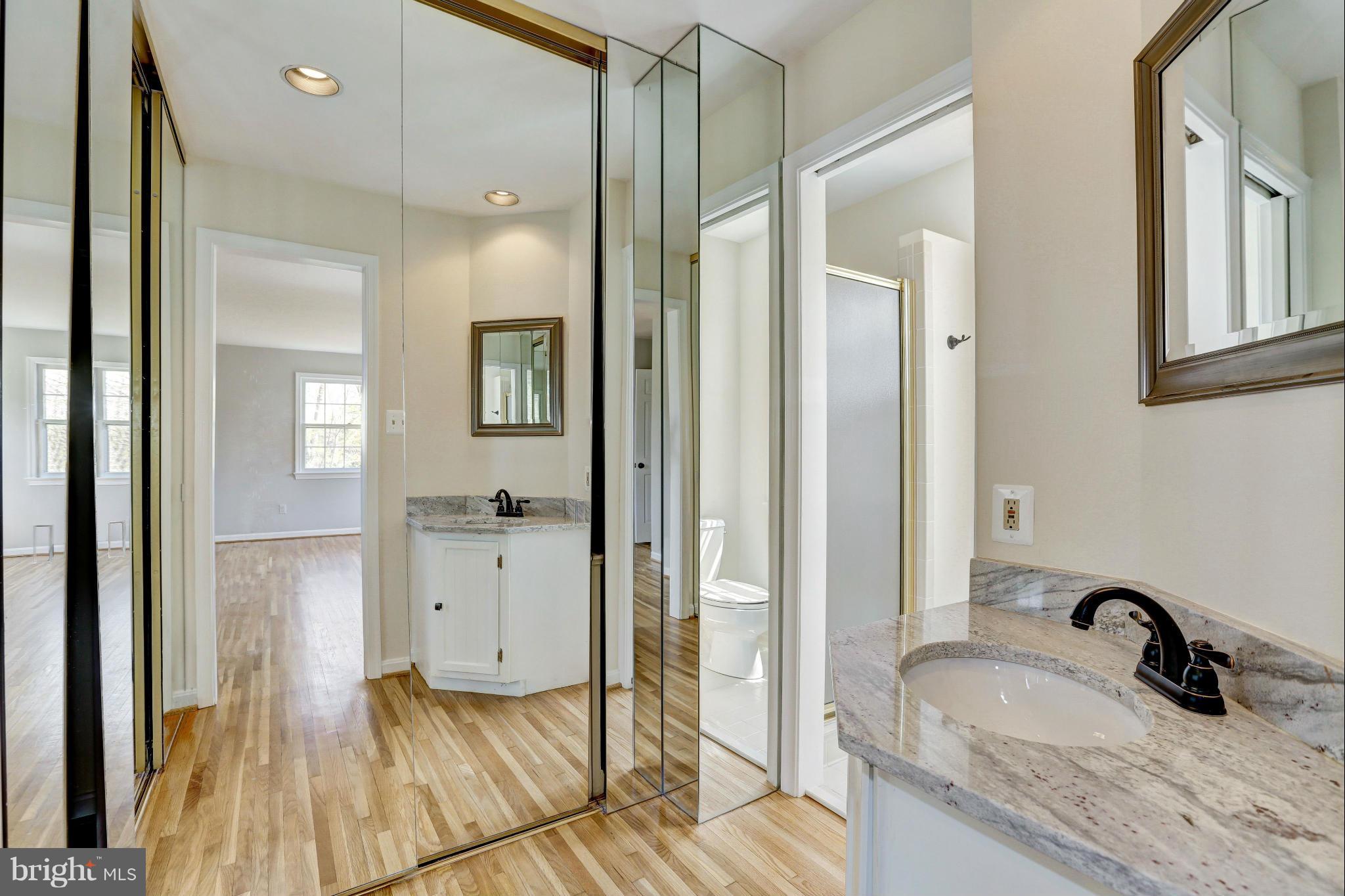 13116 Brandon Way Road Gaithersburg, MD 20878 - Photo 14 of 30 a bathroom with a sink a toilet and shower