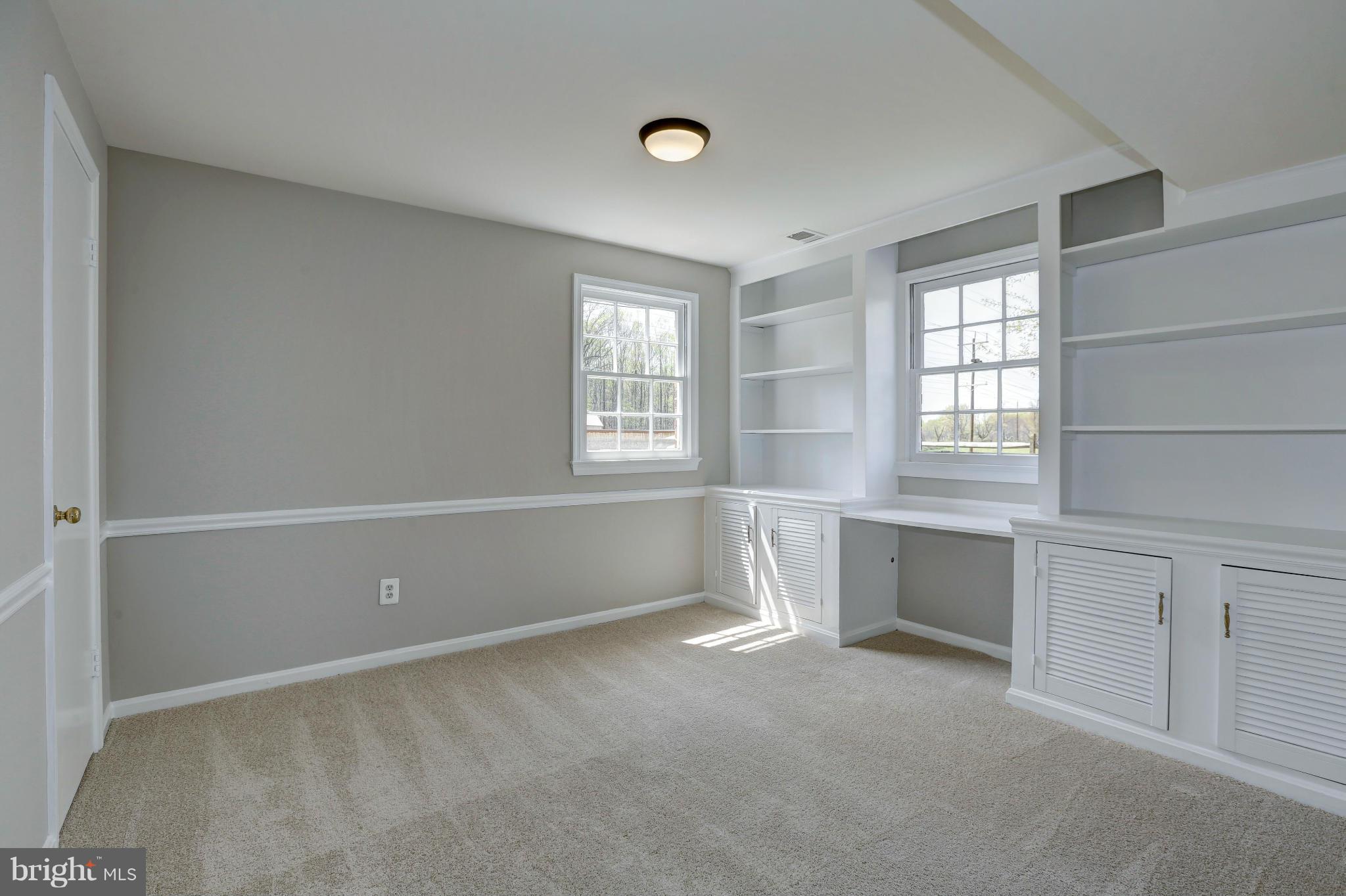 13116 Brandon Way Road Gaithersburg, MD 20878 - Photo 20 of 30 a view of an empty room with a window