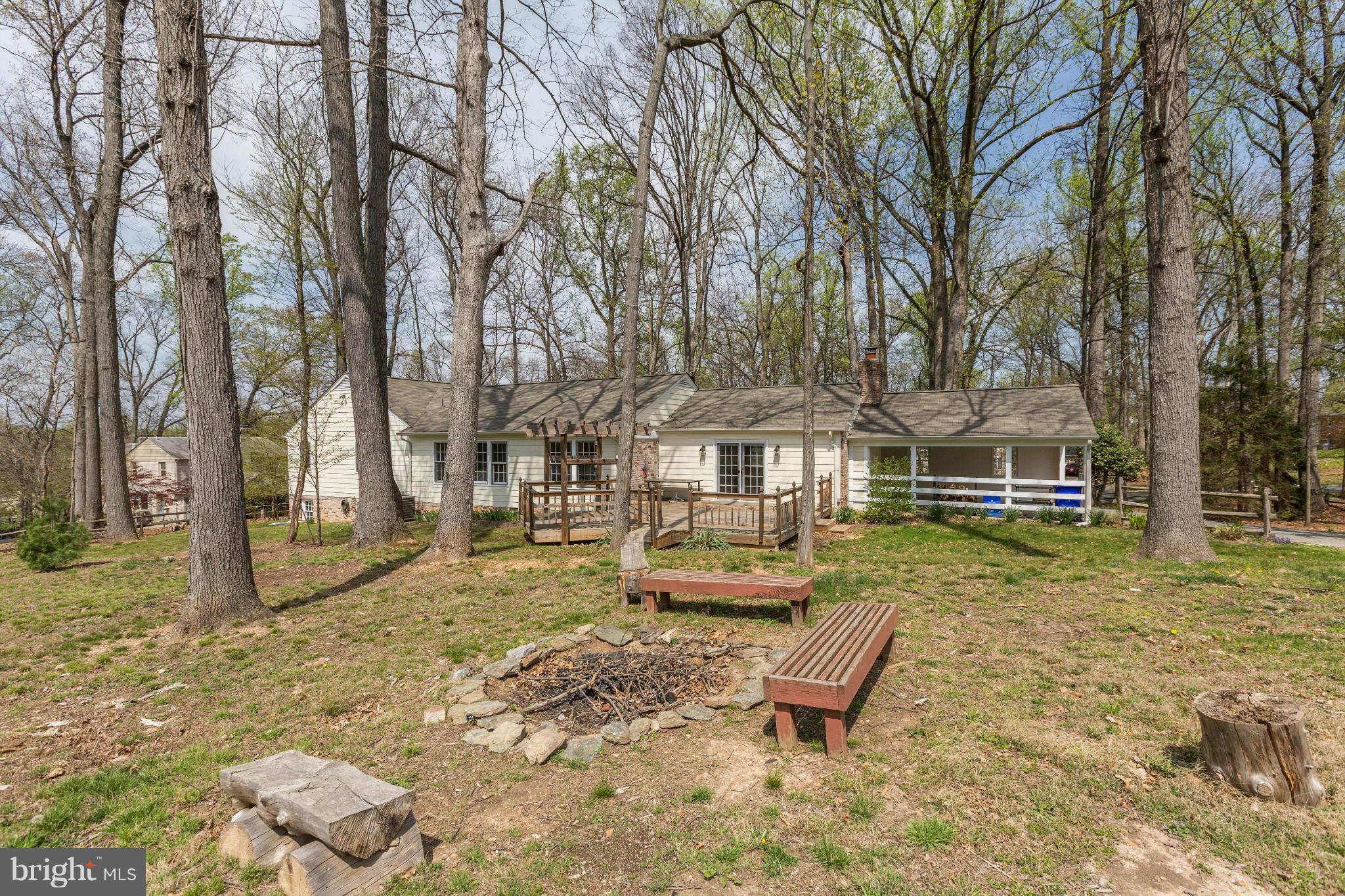 13116 Brandon Way Road Gaithersburg, MD 20878 - Photo 27 of 30 a view of a house with backyard and chairs