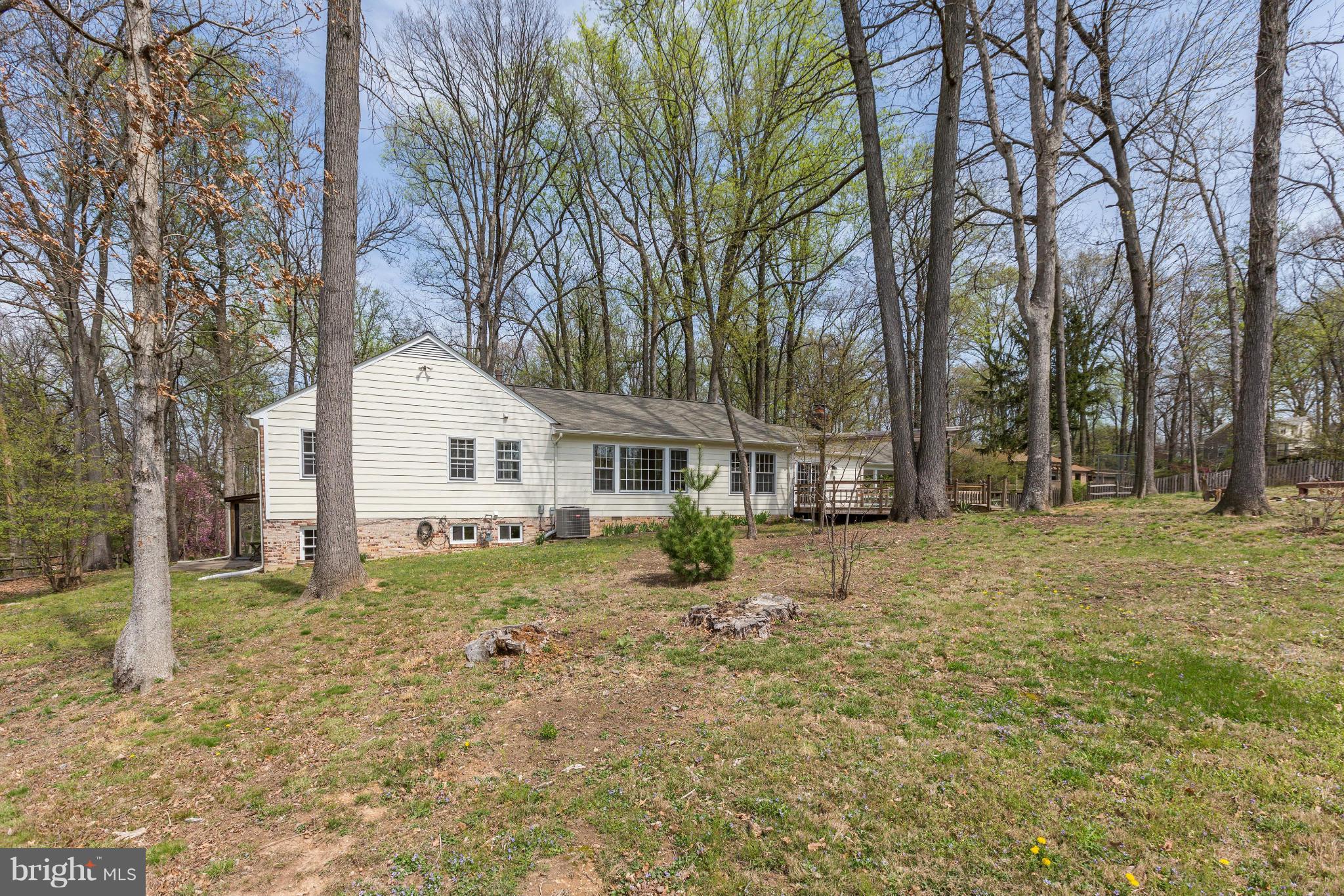 13116 Brandon Way Road Gaithersburg, MD 20878 - Photo 28 of 30 a front view of a house with a yard