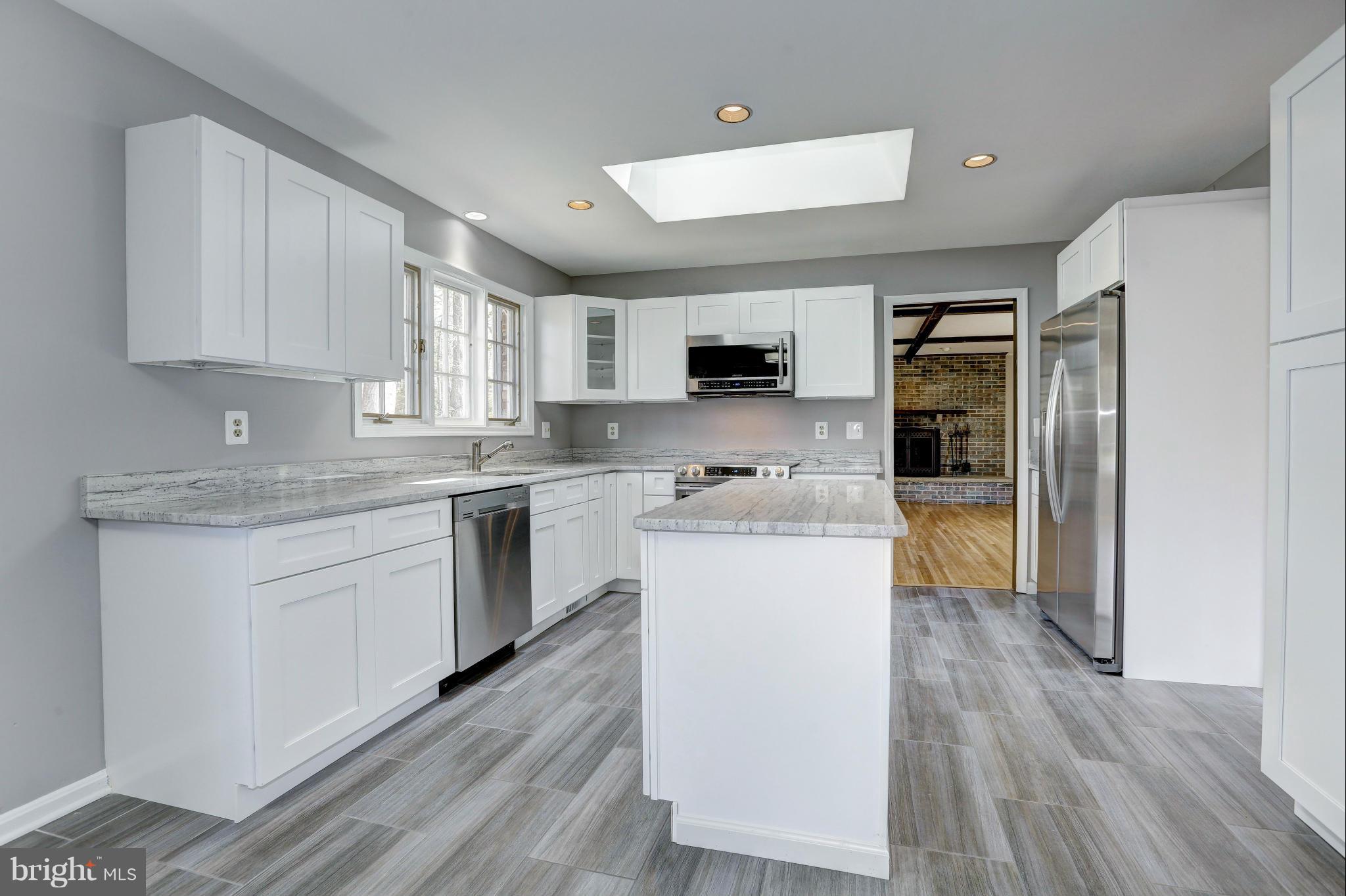 13116 Brandon Way Road Gaithersburg, MD 20878 - Photo 8 of 30 a kitchen with a refrigerator stove top oven and sink