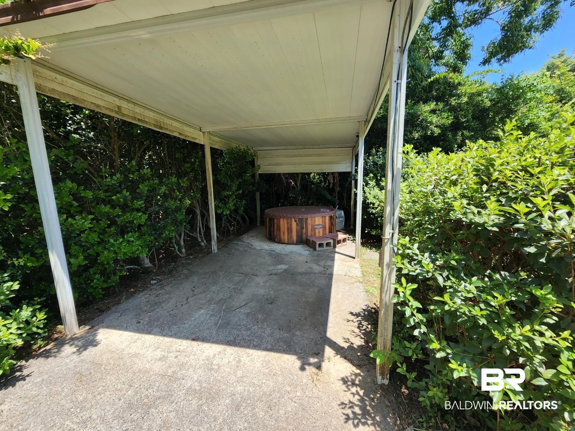 1353 Caney Loop Lillian, AL 36549 - Photo 6 of 32 Carport/Hot Tub