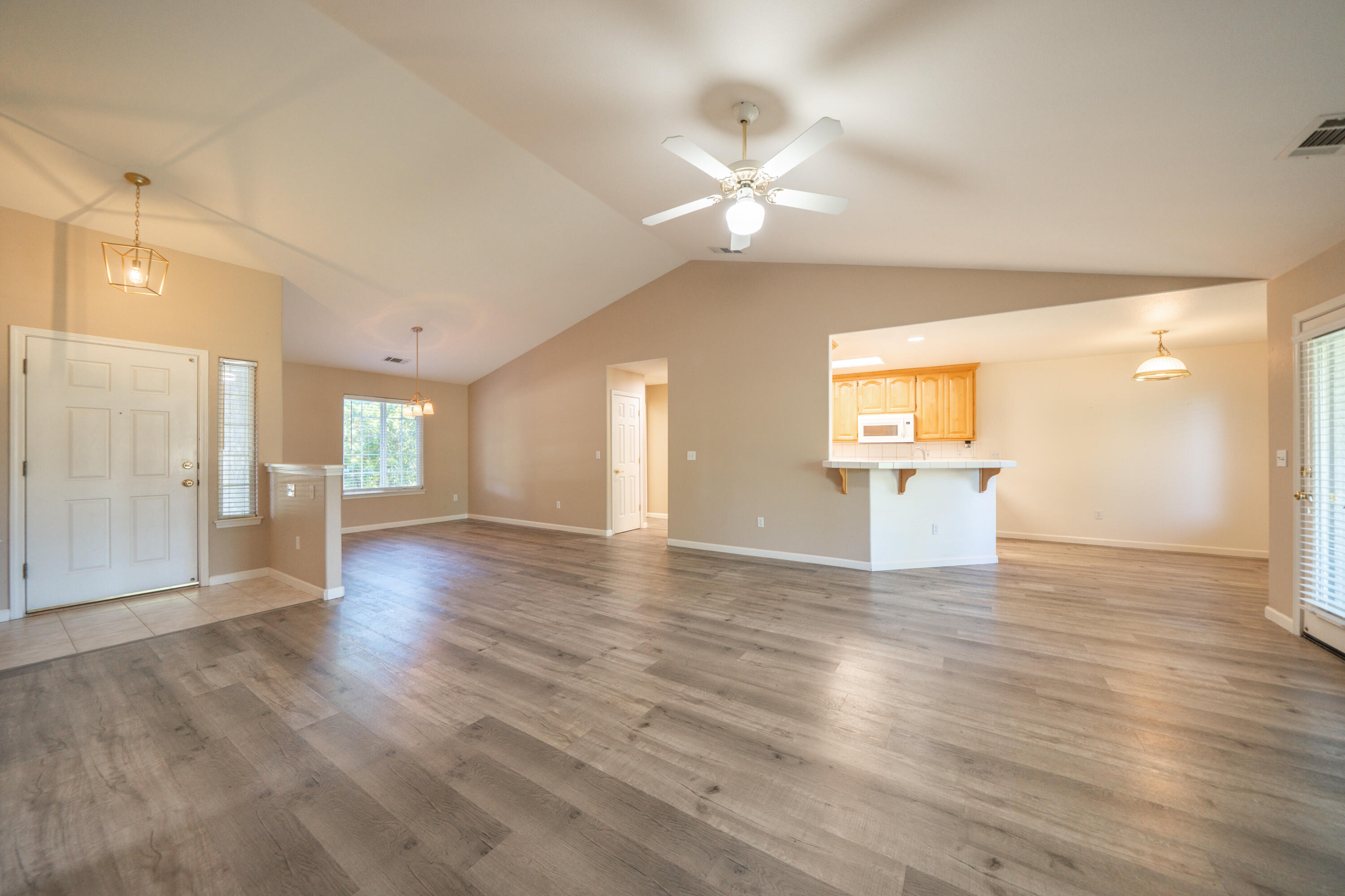 22336 Golftime Drive Palo Cedro, CA 96073 - Photo 7 of 61 Great room looking into kitchen