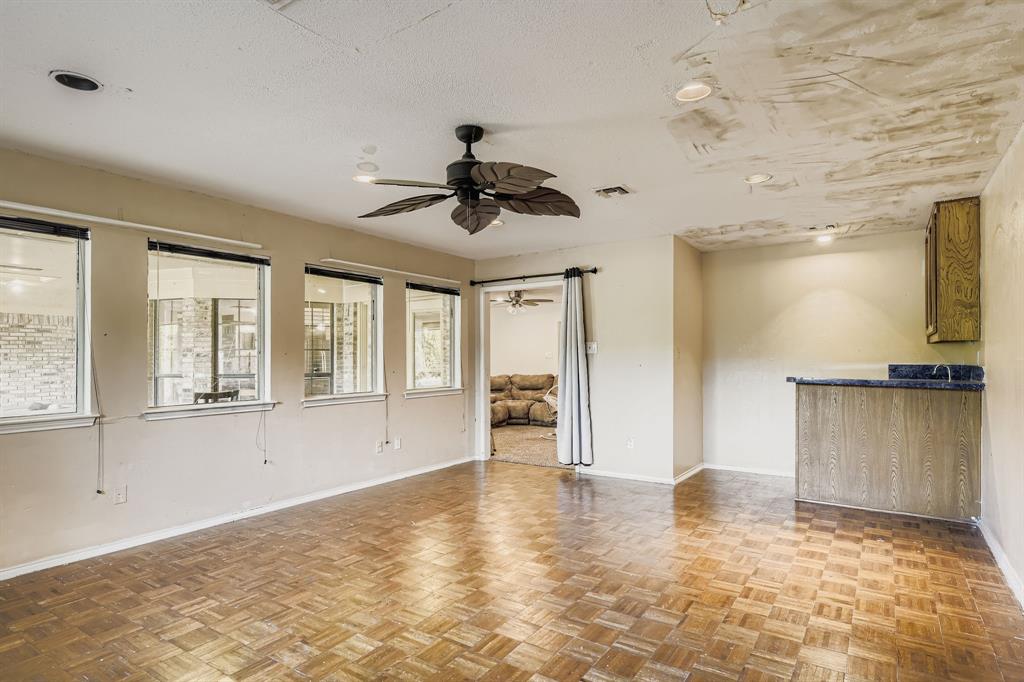 6232 North Ridge Road Fort Worth, TX 76135 - Photo 11 of 29 a view of an empty room with a window