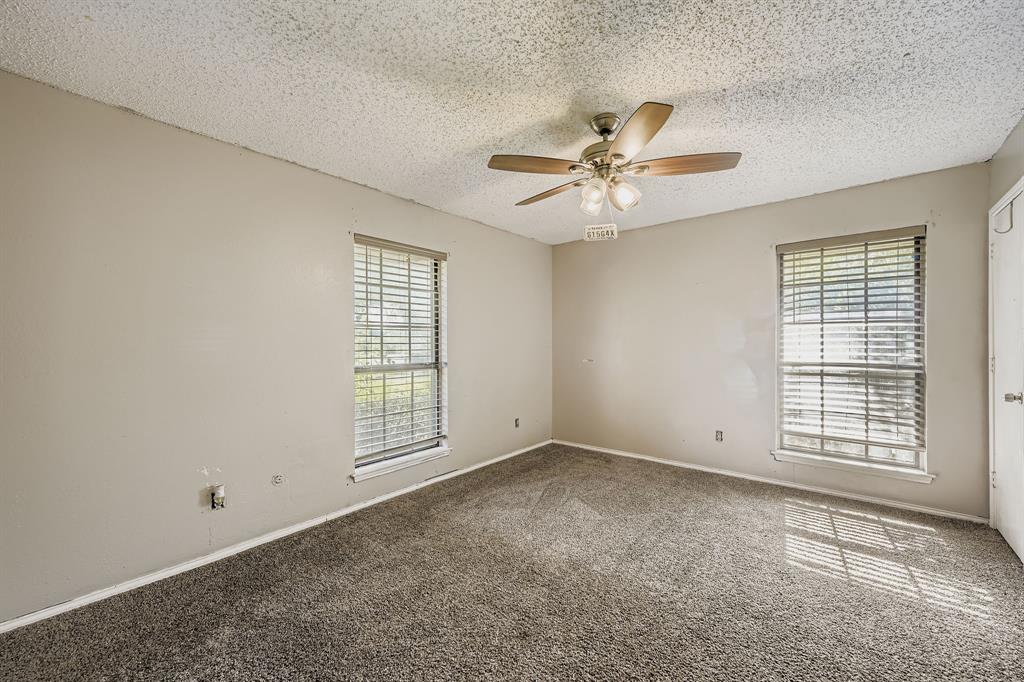6232 North Ridge Road Fort Worth, TX 76135 - Photo 19 of 29 a view of an empty room with a window