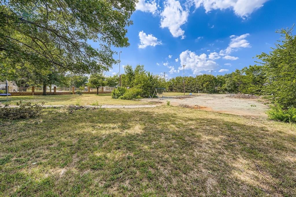6232 North Ridge Road Fort Worth, TX 76135 - Photo 28 of 29 a view of an outdoor space and a yard