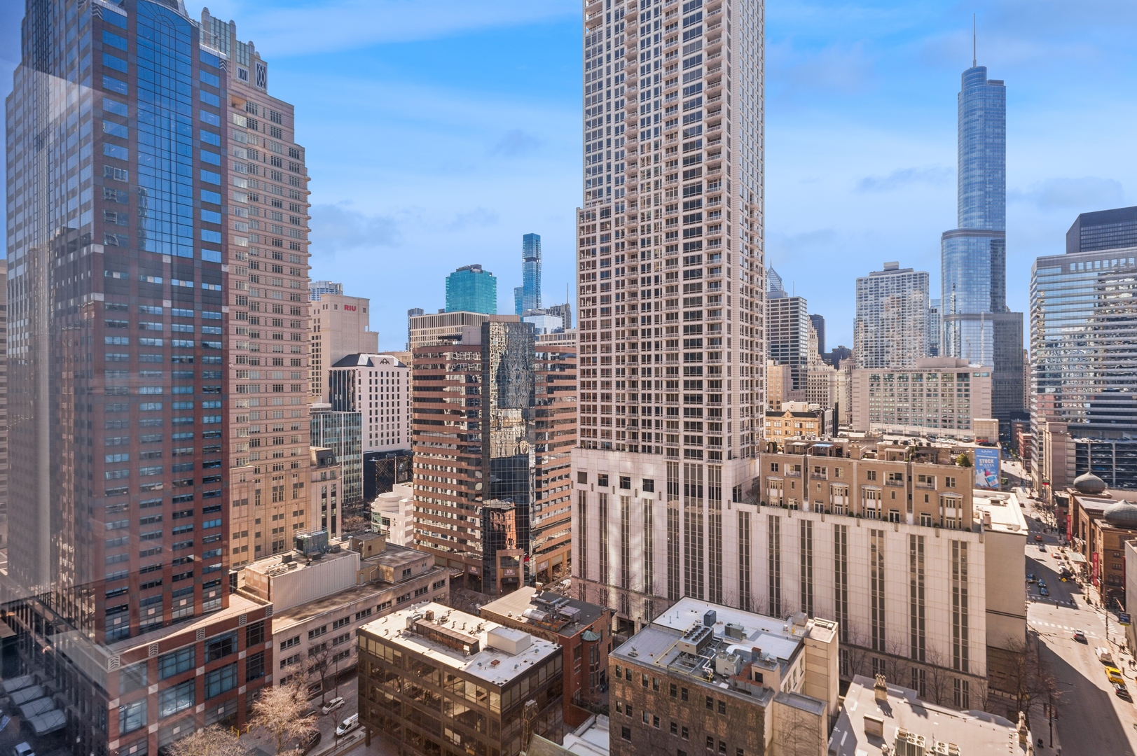 30 East Huron Street, Unit 2003 Chicago, IL 60611 - Photo 12 of 24 a city view with tall buildings