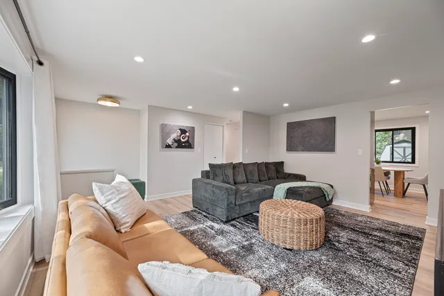 a living room with furniture and a couch