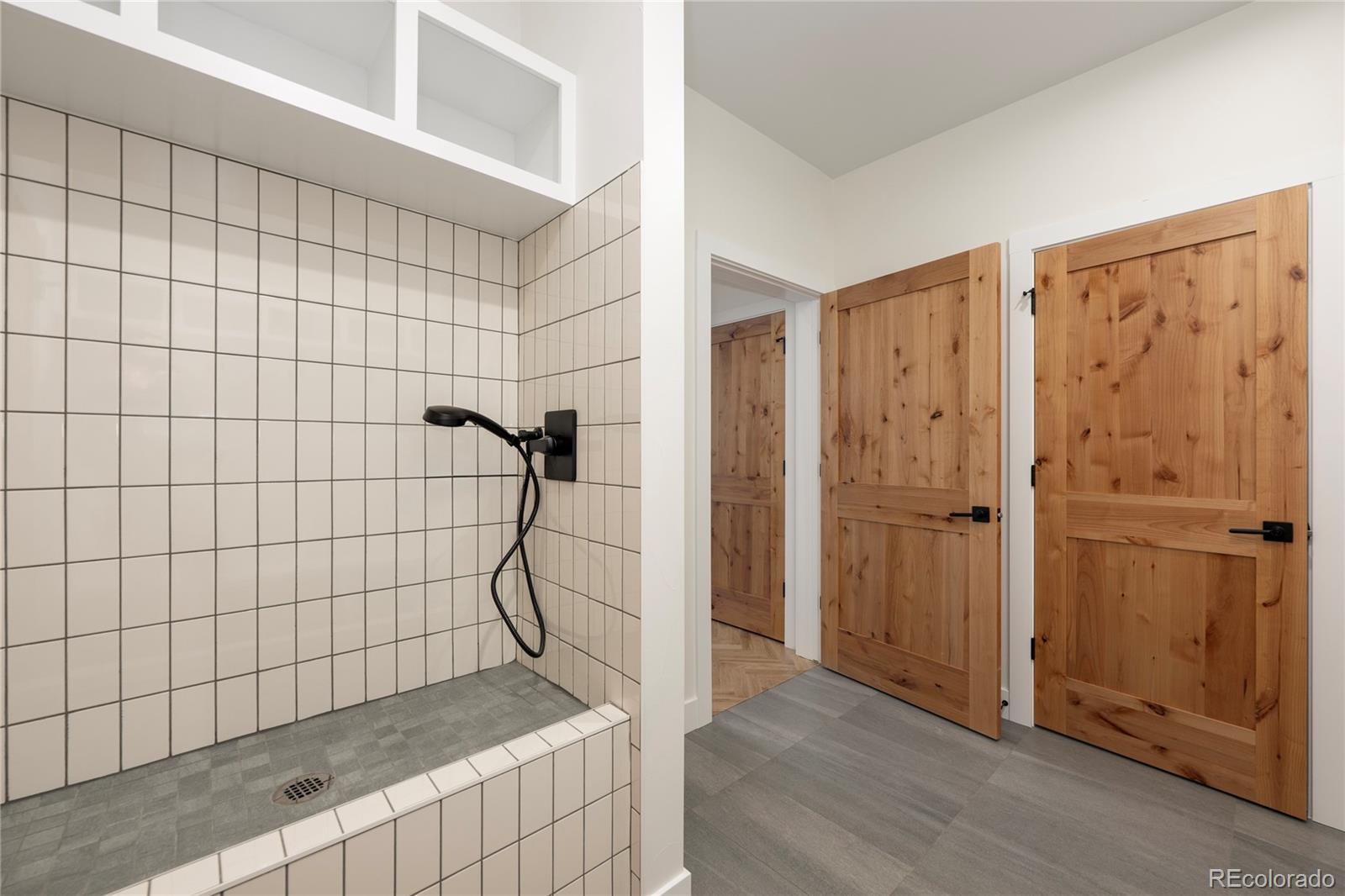 622 Upper Ranch View Drive Granby, CO 80446 - Photo 16 of 50 a bathroom with a shower