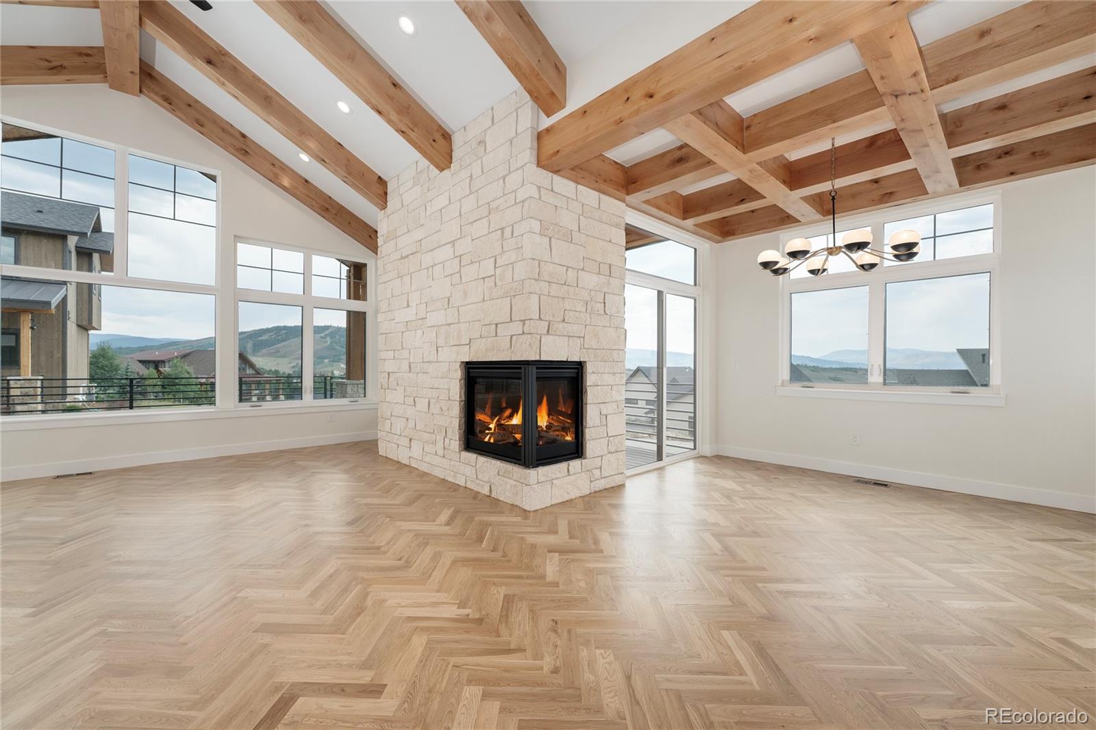 622 Upper Ranch View Drive Granby, CO 80446 - Photo 9 of 50 a view of an empty room with a fireplace
