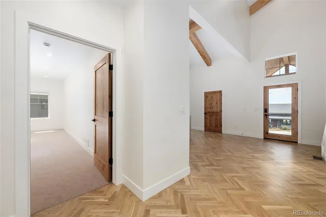 a view of cabinets with wooden floor