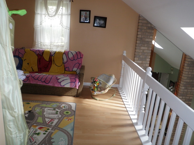 237 Walnut Street, Unit J Elmhurst, IL 60126 - Photo 5 of 8 a bedroom with furniture and a window