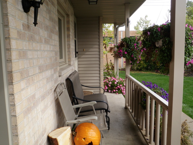 237 Walnut Street, Unit J Elmhurst, IL 60126 - Photo 8 of 8 a view of deck with furniture and garden